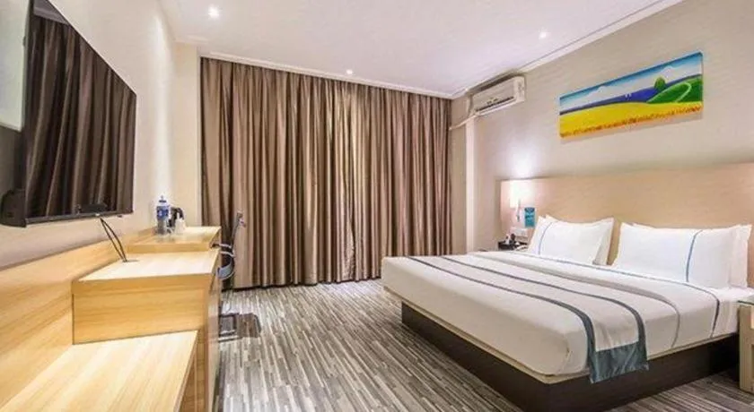 Bed in City Comfort Inn Wuzhou Wangcheng Square