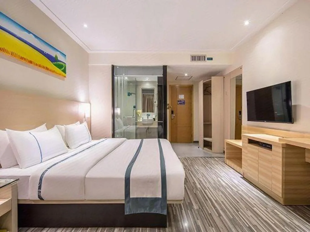 Bed in City Comfort Inn Wuzhou Wangcheng Square