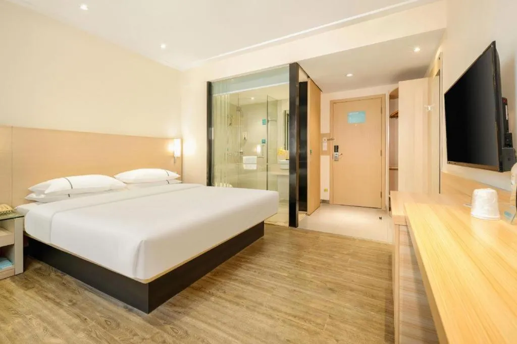 Bed in City Comfort Inn Wuzhou Wangcheng Square