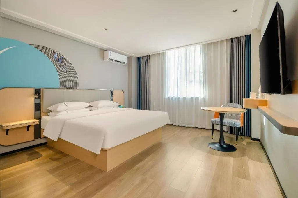 Bed in City Comfort Inn Wuzhou Wangcheng Square