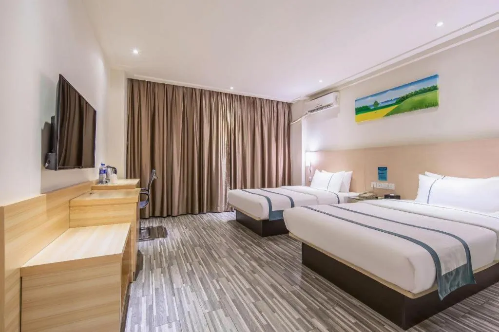 Bed in City Comfort Inn Wuzhou Wangcheng Square