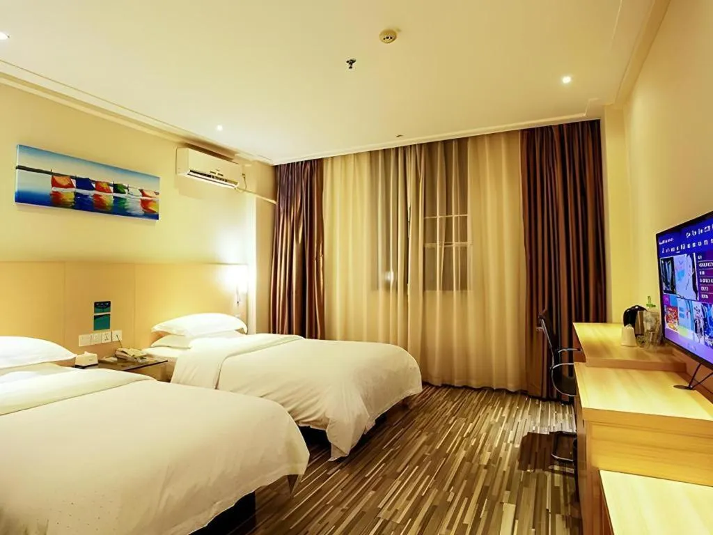 Bed in City Comfort Inn Wuzhou Wangcheng Square