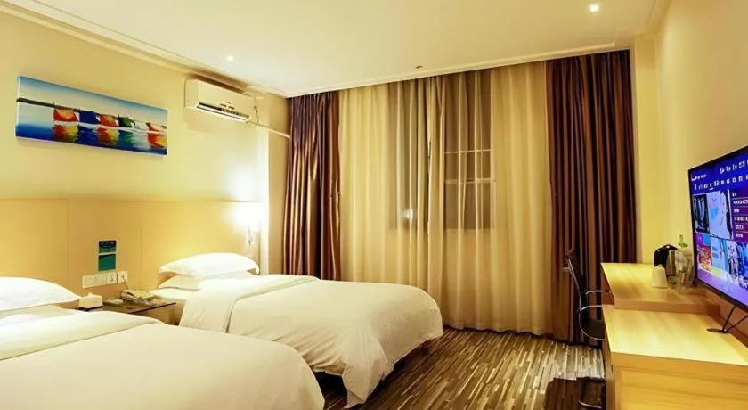 Bed in City Comfort Inn Wuzhou Wangcheng Square
