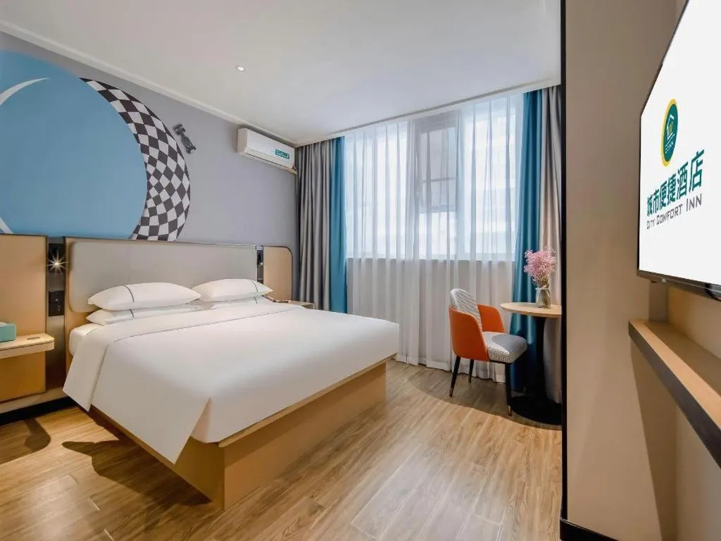 Bed in City Comfort Inn Wuzhou Wangcheng Square