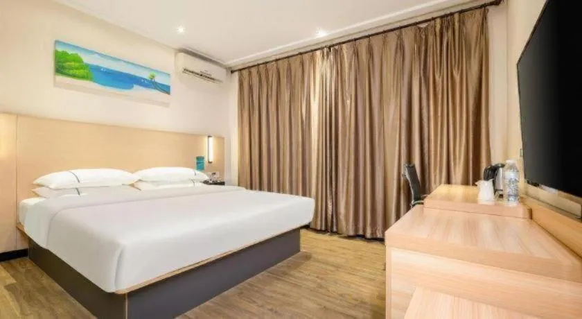 Bed in City Comfort Inn Wuzhou Wangcheng Square