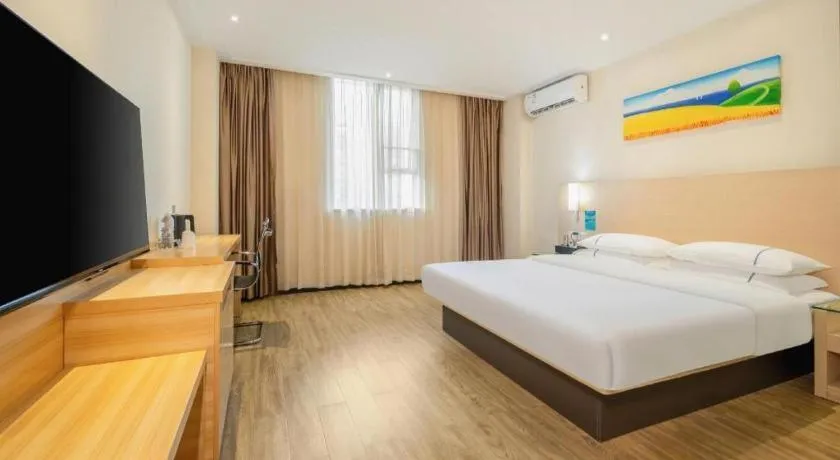 Bed in City Comfort Inn Wuzhou Wangcheng Square