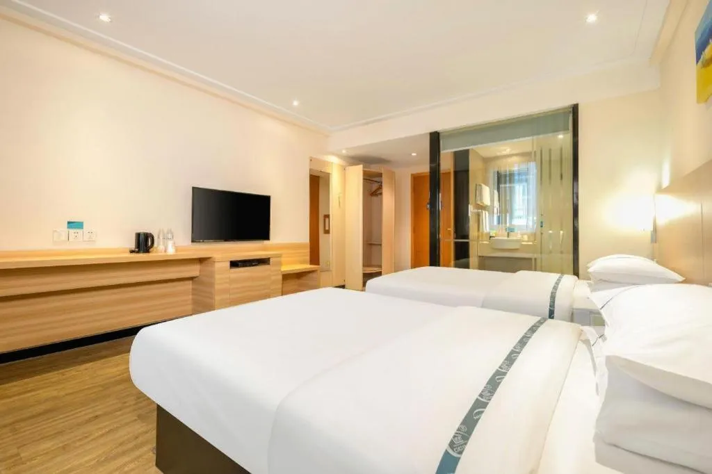 Bed in City Comfort Inn Wuzhou Wangcheng Square