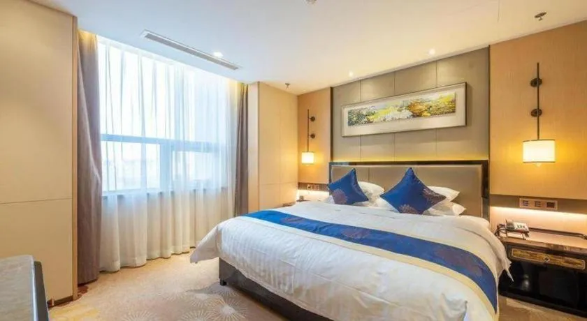 Bed in Qingshan Hotel Baotou