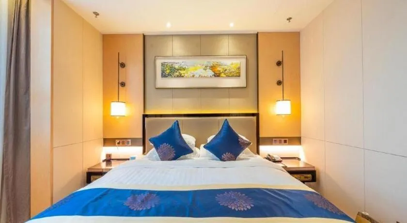 Bed in Qingshan Hotel Baotou