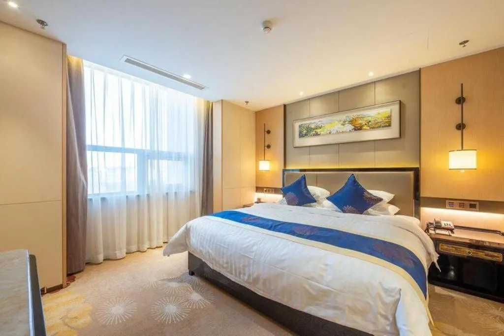 Bed in Qingshan Hotel Baotou