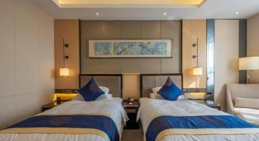 Bed in Qingshan Hotel Baotou