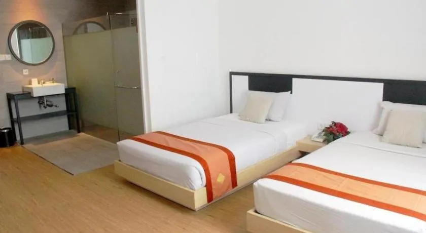 Bed in Buana Lestari Hotel