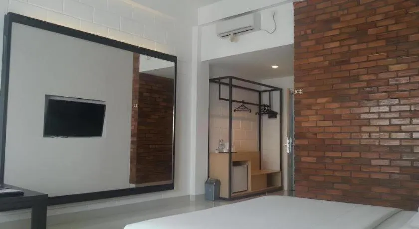 Bed in Buana Lestari Hotel