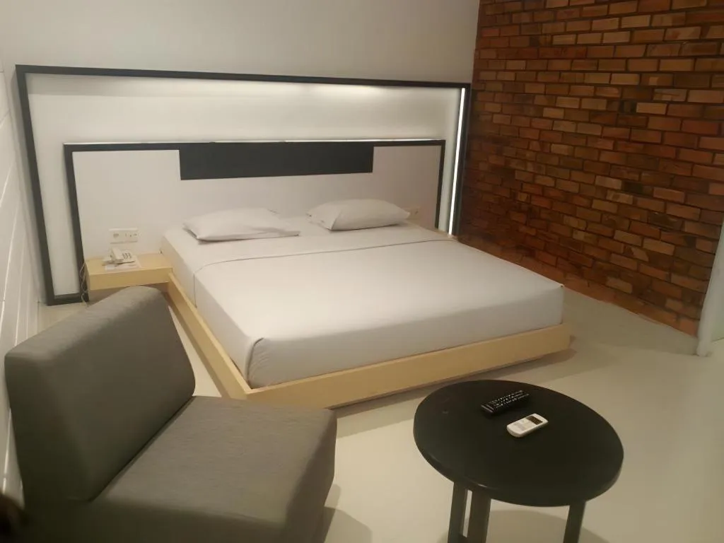 Bed in Buana Lestari Hotel