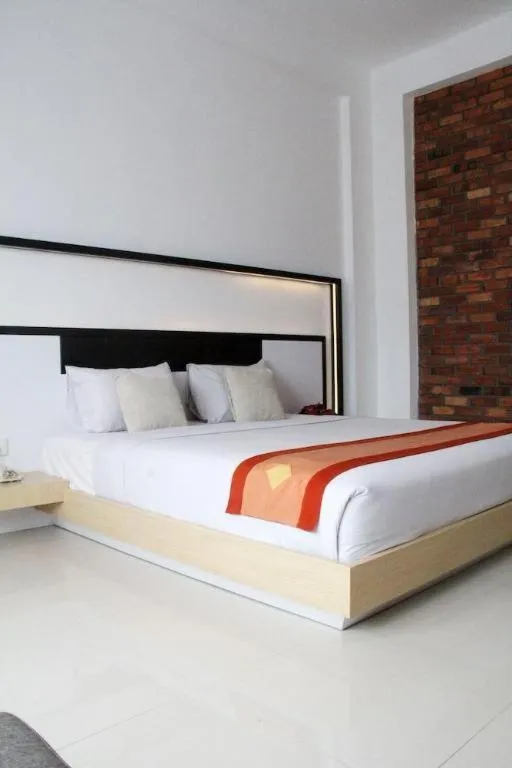 Bed in Buana Lestari Hotel