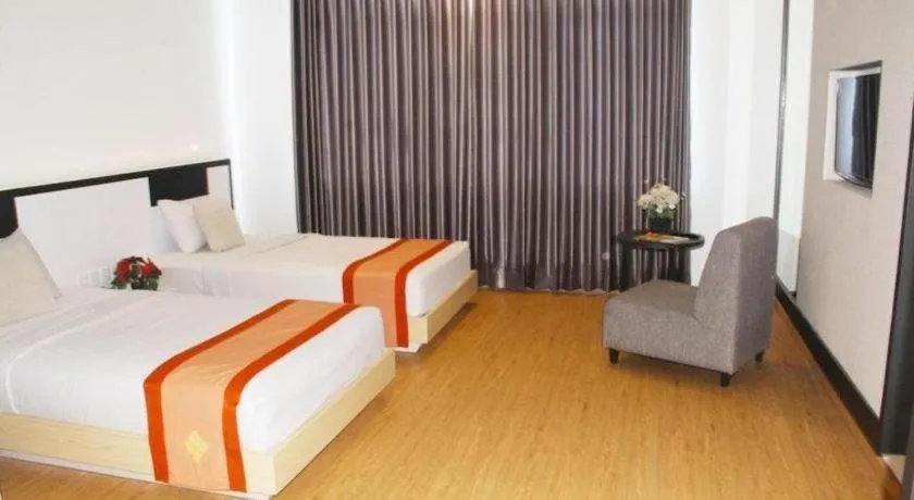 Bed in Buana Lestari Hotel