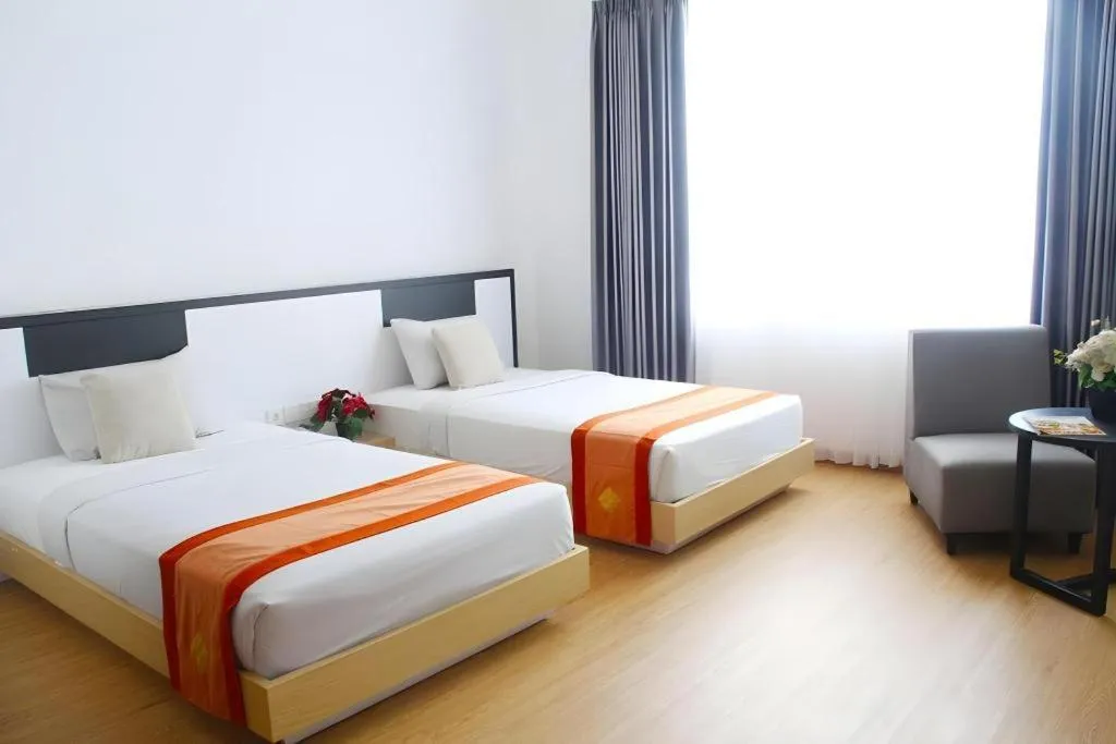 Bed in Buana Lestari Hotel