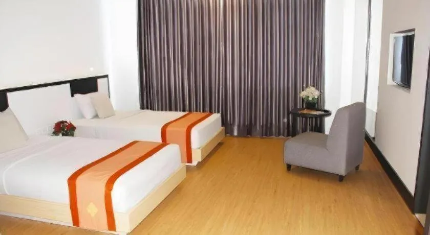Bed in Buana Lestari Hotel