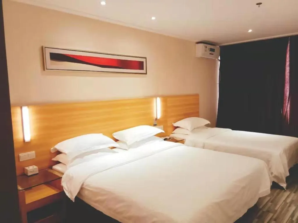 Bed in City Comfort Inn Wuhan Miaoshan