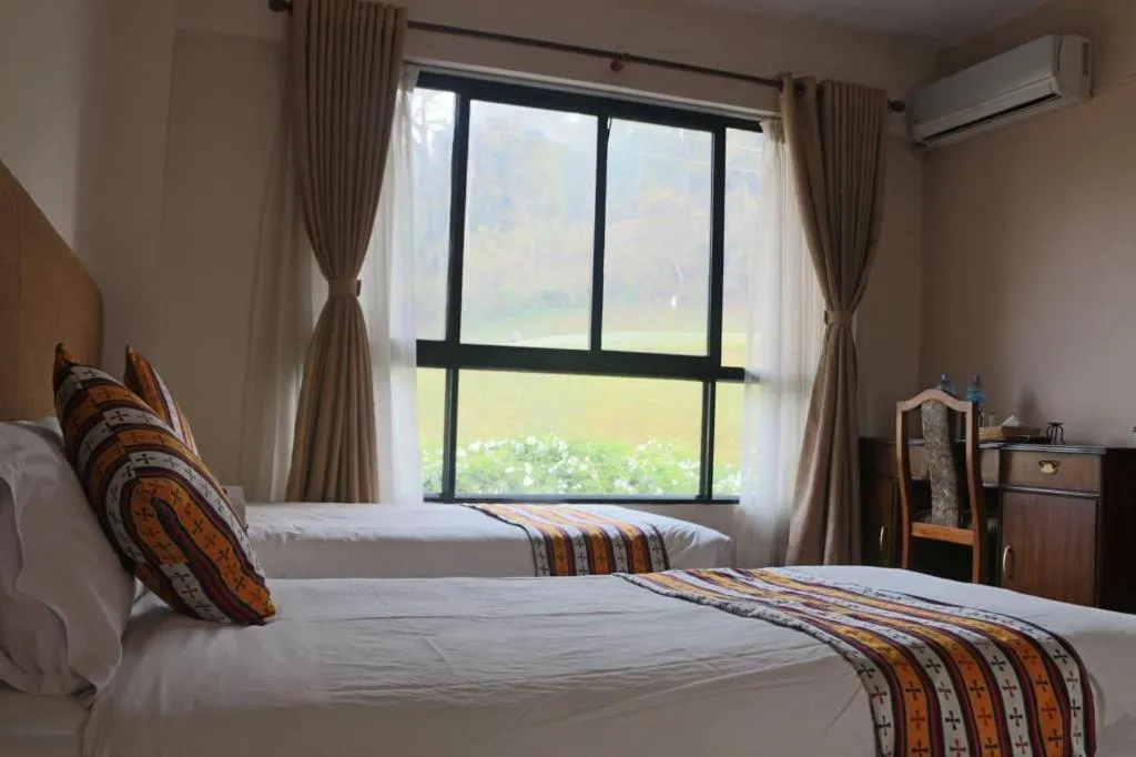 Bed in Grand Norling Hotel's Resort