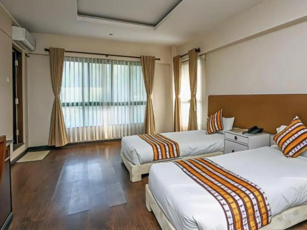 Bed in Grand Norling Hotel's Resort