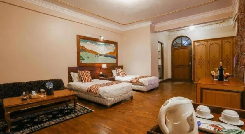 Bed in Grand Norling Hotel's Resort