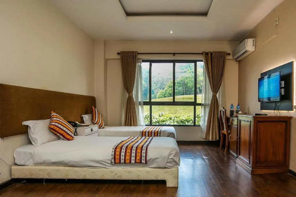 Bed in Grand Norling Hotel's Resort