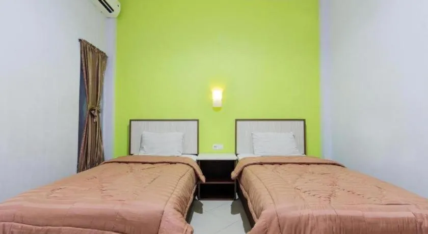 Bed in Zaen Hotel Syariah Solo