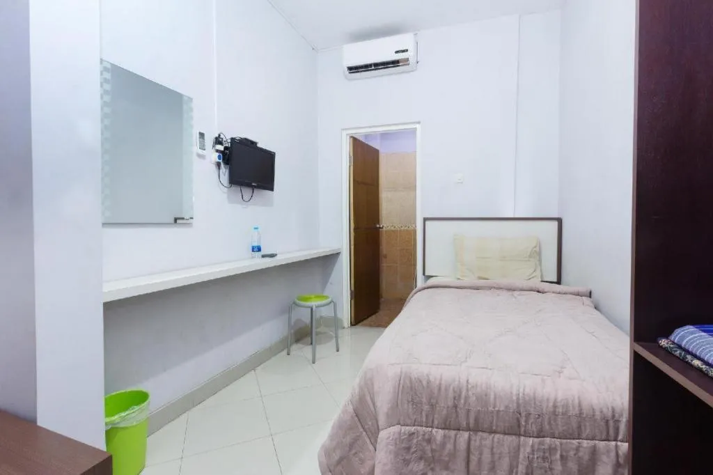 Bed in Zaen Hotel Syariah Solo