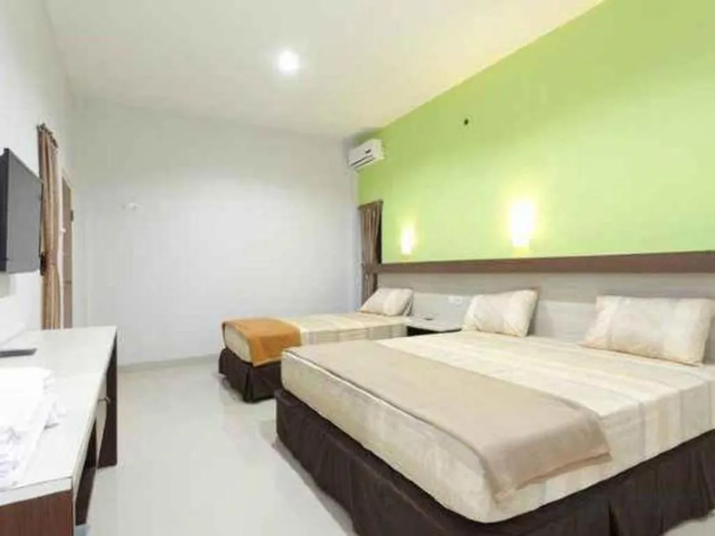 Bed in Zaen Hotel Syariah Solo