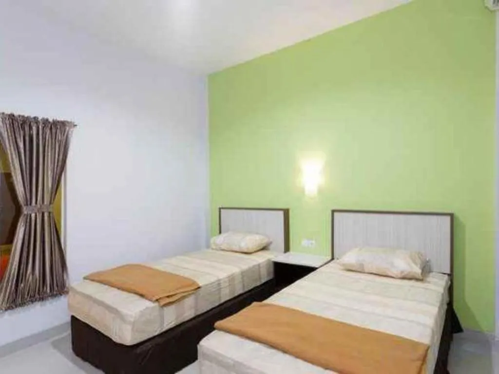 Bed in Zaen Hotel Syariah Solo