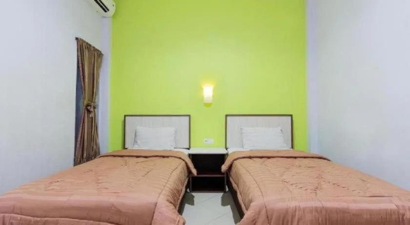 Bed in Zaen Hotel Syariah Solo