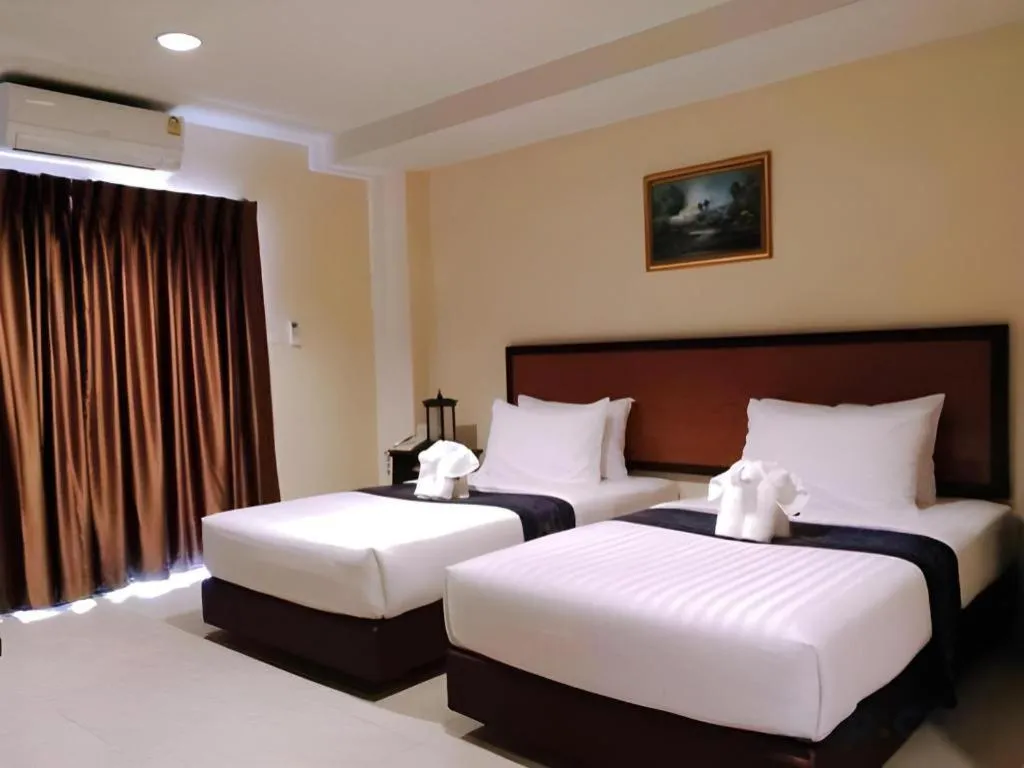 Bed in Rayong Lanna Hotel
