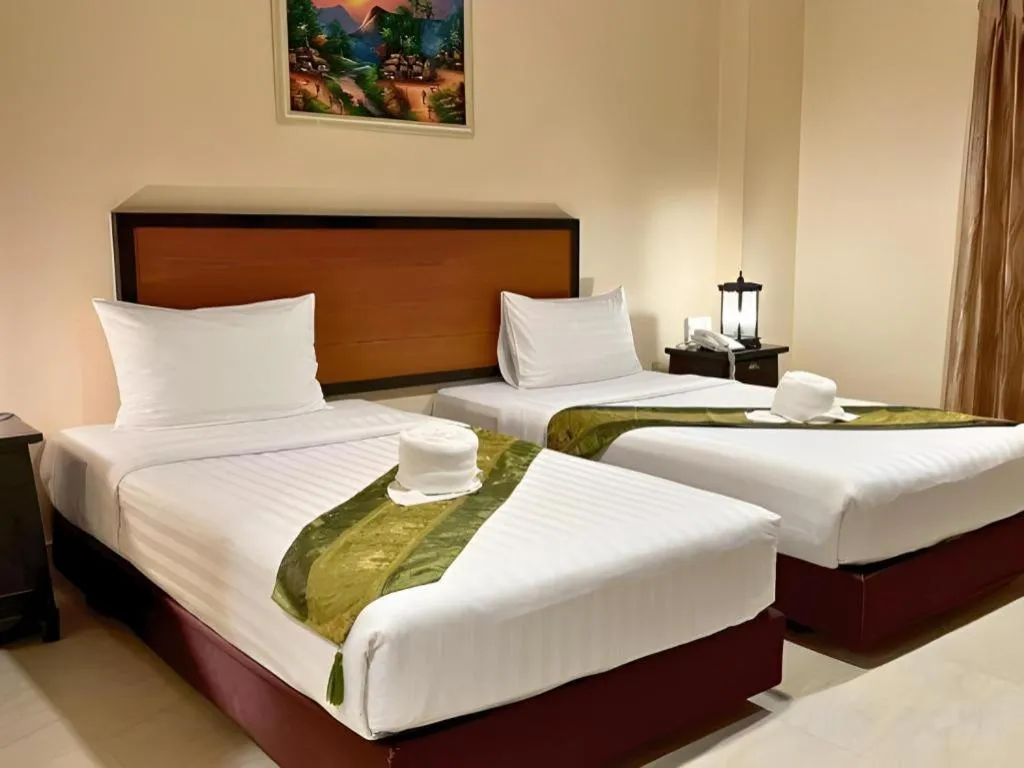 Bed in Rayong Lanna Hotel