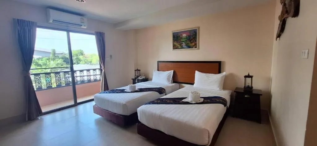 Bed in Rayong Lanna Hotel