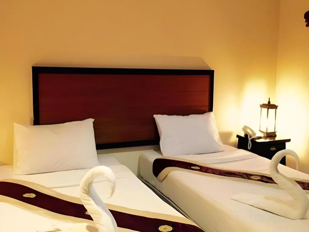 Bed in Rayong Lanna Hotel