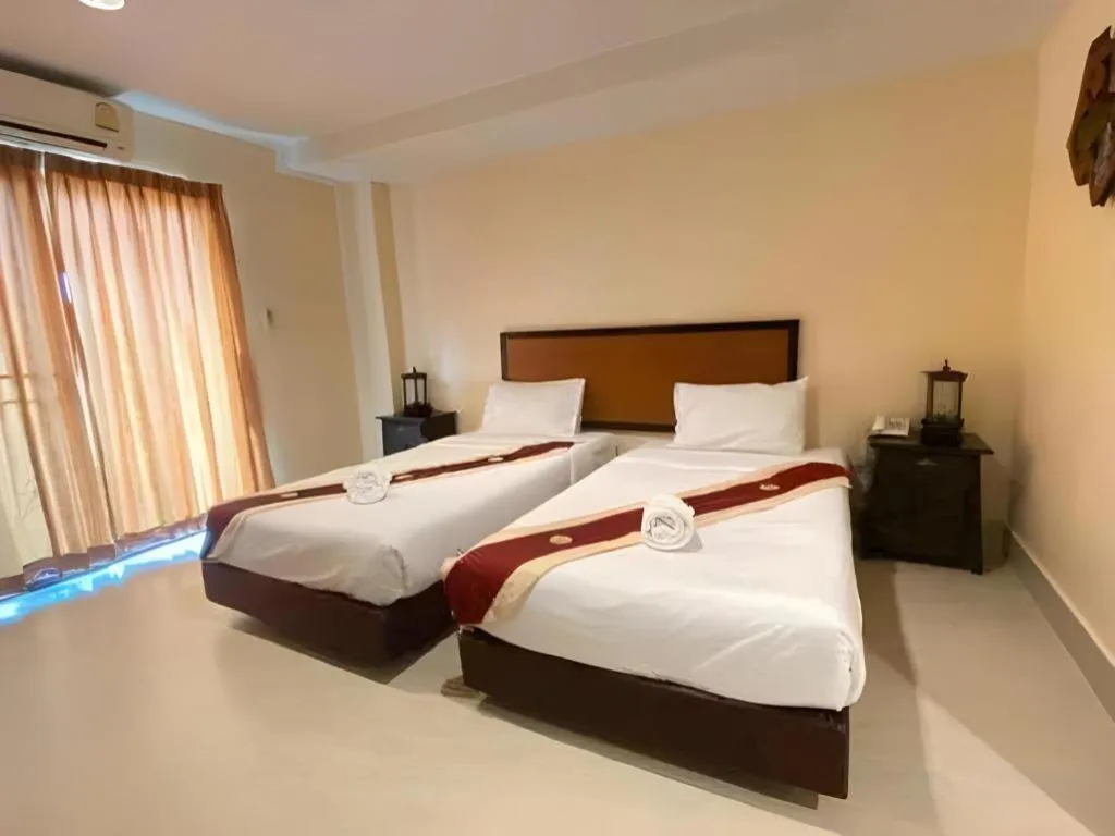 Bed in Rayong Lanna Hotel