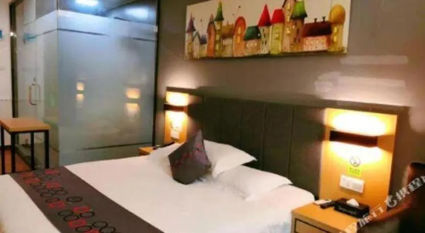 Bed in Yi Mi Hotel Shenzhen Longgang Pinghu South China City