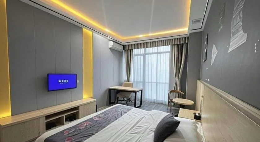 Bed in Yi Mi Hotel Shenzhen Longgang Pinghu South China City