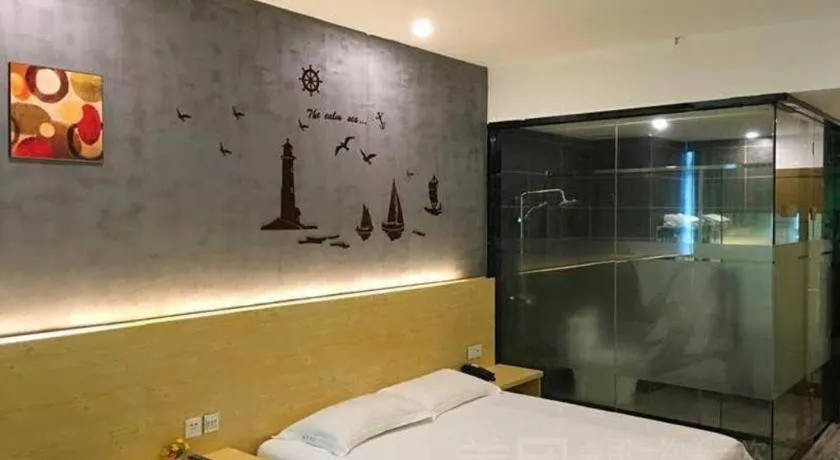Bed in Yi Mi Hotel Shenzhen Longgang Pinghu South China City