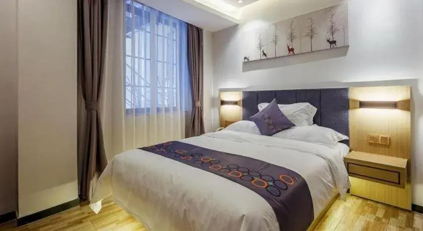 Bed in Yi Mi Hotel Shenzhen Longgang Pinghu South China City Bed in Yi Mi Hotel Shenzhen Longgang Pinghu South China City