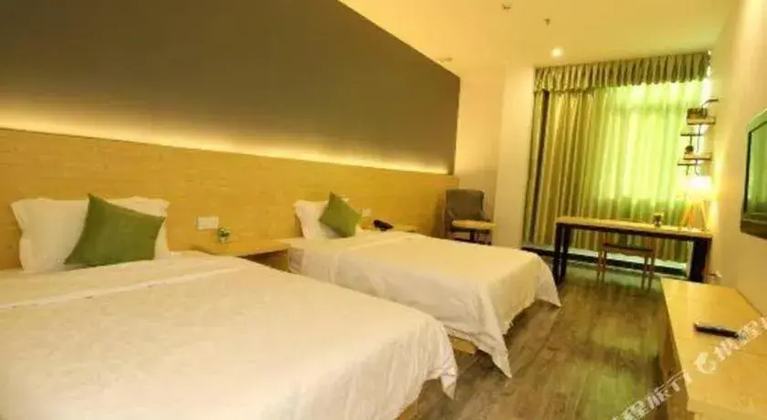 Bed in Yi Mi Hotel Shenzhen Longgang Pinghu South China City Bed in Yi Mi Hotel Shenzhen Longgang Pinghu South China City