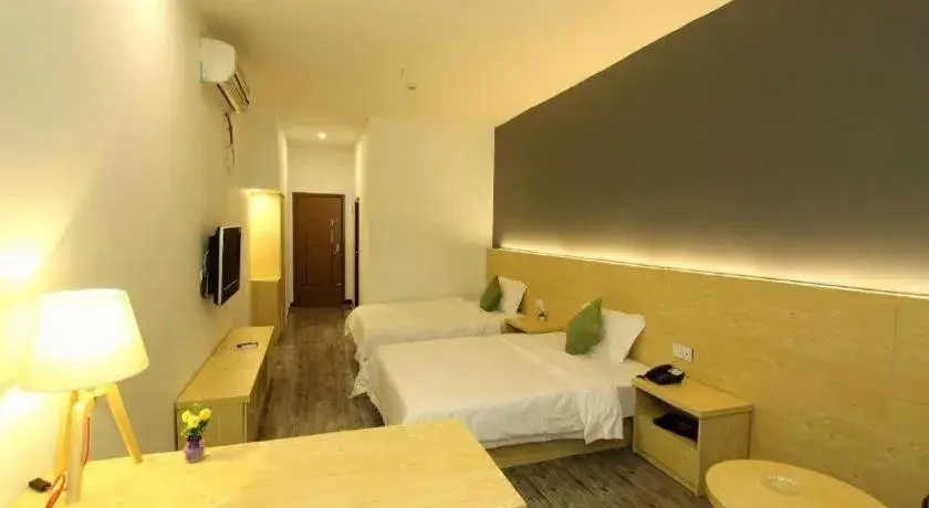 Bed in Yi Mi Hotel Shenzhen Longgang Pinghu South China City Bed in Yi Mi Hotel Shenzhen Longgang Pinghu South China City