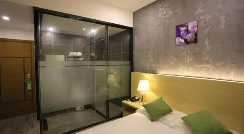 Bed in Yi Mi Hotel Shenzhen Longgang Pinghu South China City Bed in Yi Mi Hotel Shenzhen Longgang Pinghu South China City