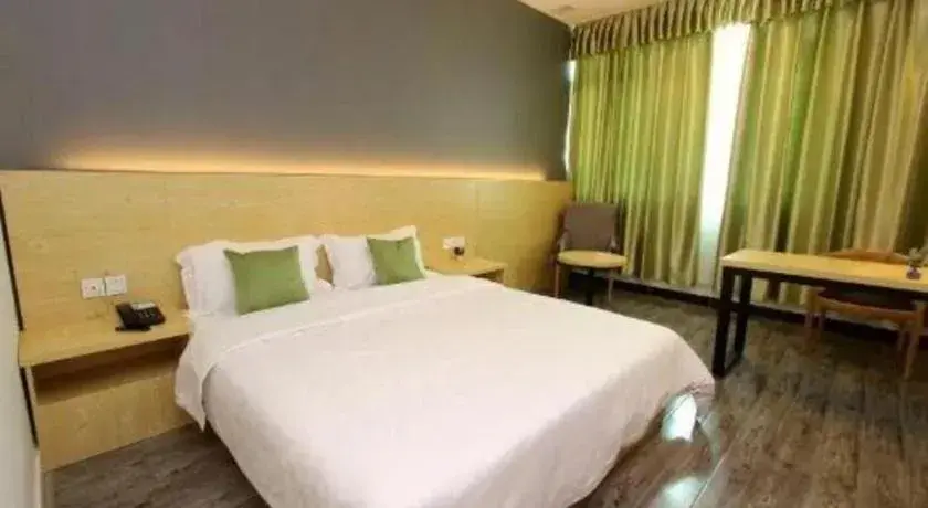 Bed in Yi Mi Hotel Shenzhen Longgang Pinghu South China City Bed in Yi Mi Hotel Shenzhen Longgang Pinghu South China City