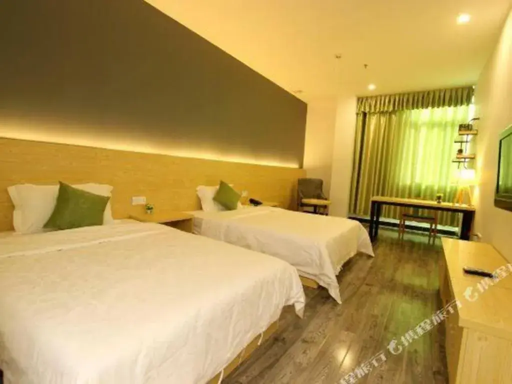 Bed in Yi Mi Hotel Shenzhen Longgang Pinghu South China City Bed in Yi Mi Hotel Shenzhen Longgang Pinghu South China City