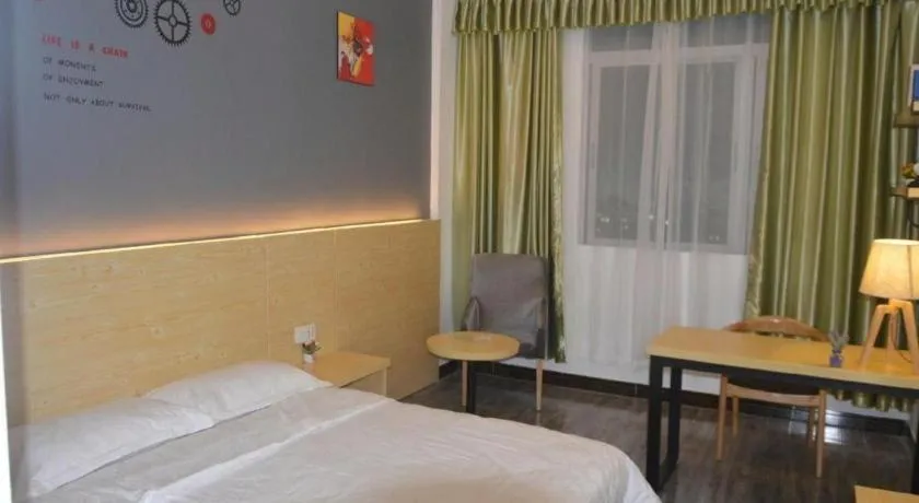 Bed in Yi Mi Hotel Shenzhen Longgang Pinghu South China City