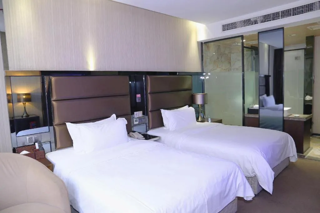 Bed in Liwan International Hotel Chengdu