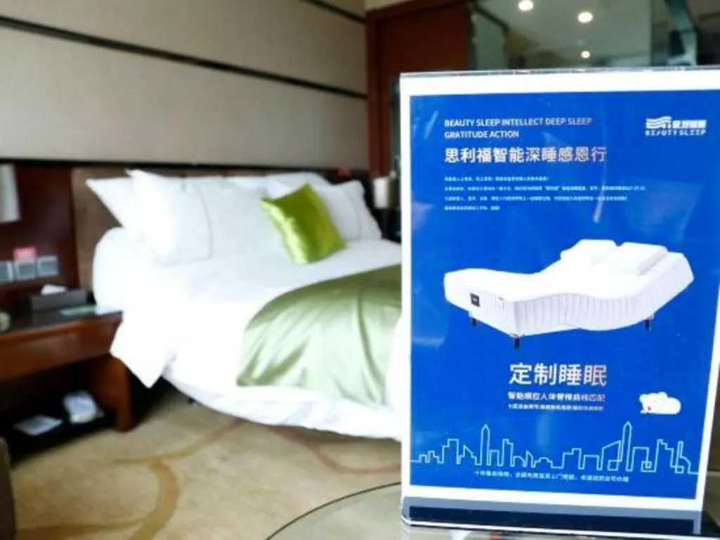 Bed in Liwan International Hotel Chengdu