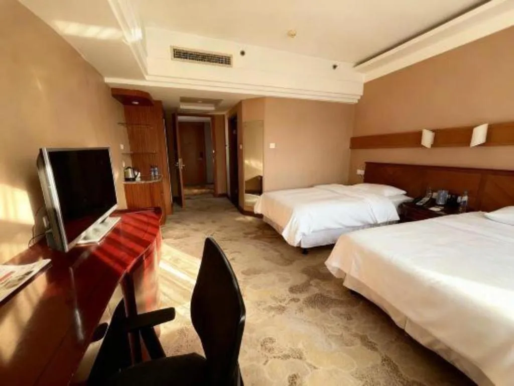 Bed in Yantai Bihai Hotel